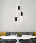 Three Light Kitchen Island Pendant In Matte Black Finish With Clear Glass Cylinder Shades And Bubble Crystal Orbs in dining room
