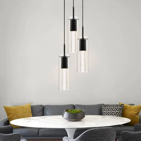 Three Light Kitchen Island Pendant In Matte Black Finish With Clear Glass Cylinder Shades And Bubble Crystal Orbs in dining room