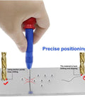 Hand using Five Piece Automatic Center Punch Kit Spring Loaded Adjustable Impact Built Tough Brass Drill Starter Pin on metal surface.