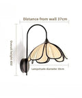 Nordic Floral Petal Wall Sconce Fabric Shade Wall Light,Warmth with black metal arm, 37cm distance from wall, 30cm shade diameter.