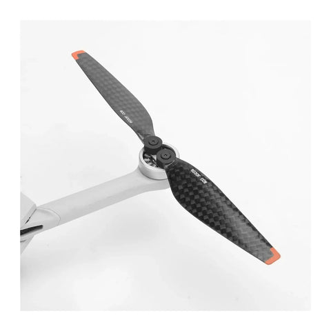 Premium Carbon Fiber Propeller Blades Compatible with Mini 3 Pro and Mini 4 Pro Genuine 6030F Rotors showing a close-up view of the blades.