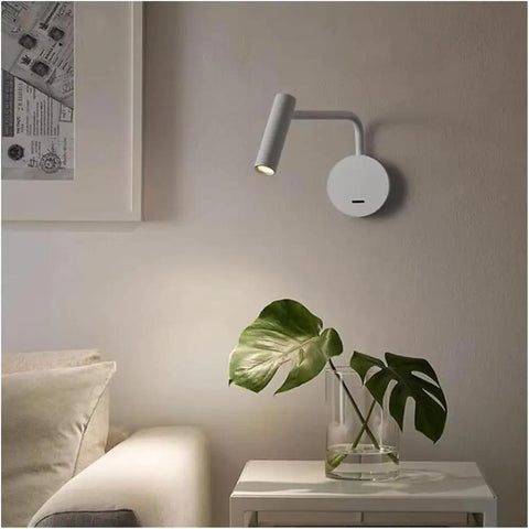 Wall Sconce Modern Indoor LED Adjustable Bedside Lamp Nordic Reading Infinite Indoor Bedroom Reading Light(White) mounted beside plant.