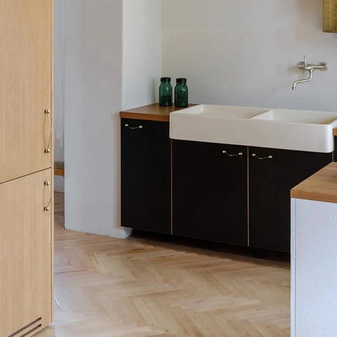 Modern kitchen with One Pack 5 Inch Titanium Silver Cabinet Handles Ball Tip Pulls With Polished Solid Brass Core And Premium Titanium Silver Finish installed on cupboards