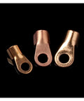 Check Out This Awesome 70 Pack Of Premium Copper Circular Splice Terminals And Wire Connectors Including All Sized OT Open Ring Lugs For Battery Cables With High Amp Assortment Kit That Makes Wiring A Total Breeze. Three copper OT open ring lugs on black background