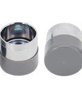 Front view of a pair of 1.98-inch stainless steel trailer wheel bearing protectors with grey and chrome dust covers