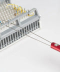 Jonard Tools Jic-2257M Metal Wire Loop Puller With Red Anodized Aluminum Handle, 8-1/2" Length extracting wires from a terminal block.