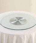 Heavy Duty 43 Inch Lazy Susan Turntable Crafted From Ultra Thick Tempered Glass With Rock Solid Aluminum Base on a dining table.