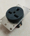Heavy Duty Flush Mount Power Receptacle Nema 6 30R 30 Amp Straight Blade Outlet With Solid Brass Contacts No Sweat Wiring For Ev Chargers Welders And Generators Black Ul Certified close-up showing brass pins and nylon shell.