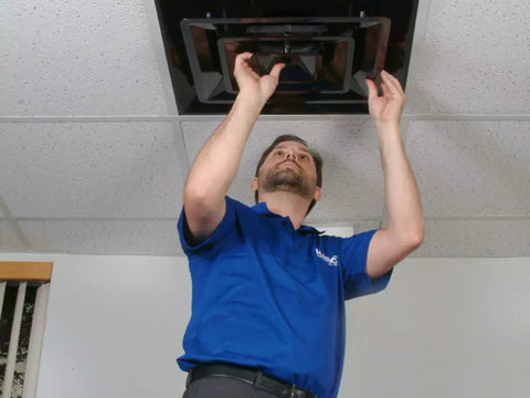Man installing 2x2 Foot Lay In HVAC Ceiling Diffuser With 3 Cone Supply And 10 Inch Pre Molded Boot ABS Plastic Grille