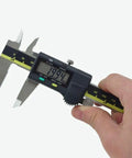 Hand holding 6 Inch Absolute AOS Caliper With Ultra High Resolution 0.0005 Inch And 0.01 Millimeter Stainless Steel Measurement Tool