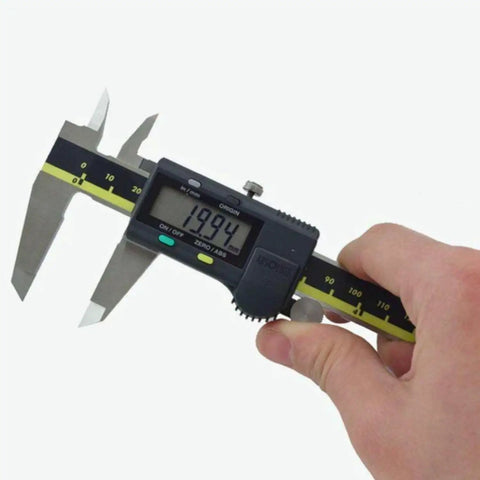 Hand holding 6 Inch Absolute AOS Caliper With Ultra High Resolution 0.0005 Inch And 0.01 Millimeter Stainless Steel Measurement Tool