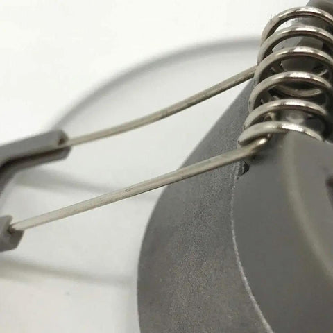 Close-up of DJVHSRI Recessed Lighting Housing Trim Kits with thin aluminum downlight components and attachment springs.