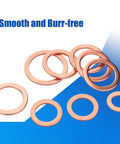 350 Piece Copper Washers Kit With Smooth Burr Free Seals Metric Sealing Crush Washers For Auto Plumbing And Machinery Durable Copper Washers Set With Standard Hole For Quick Installation. Copper washers laid out on blue and white background