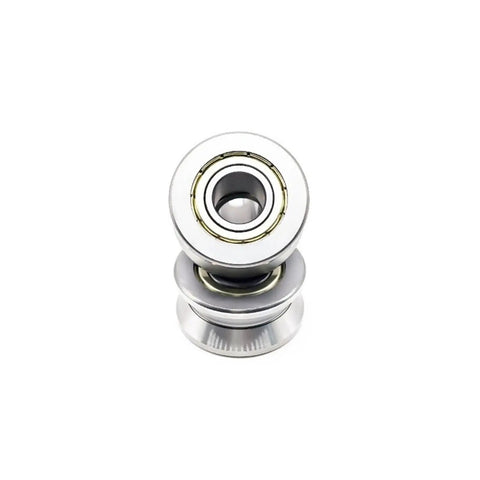 Two Piece V Groove Linear Bearing Replacement With Precision Steel Rollers For Frictionless Shaft Guidance And Steady Rotation In Automation Gear Sized At Twelve By Thirty Nine Point Nine By Eighteen Millimeters Built Damn Tough To Crush The Daily Grind, showing front view of steel roller bearing.