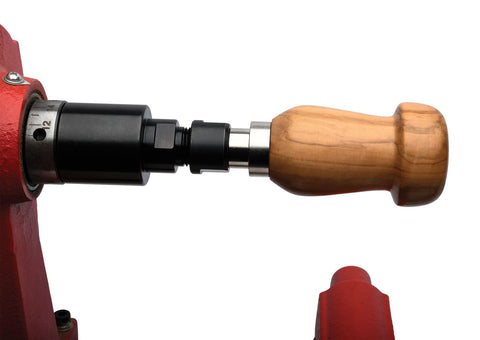 Handle Anything Chuck System for Woodturning Projects Kit With Collet Chuck Base PKHA01 attached to a wooden handle on lathe.