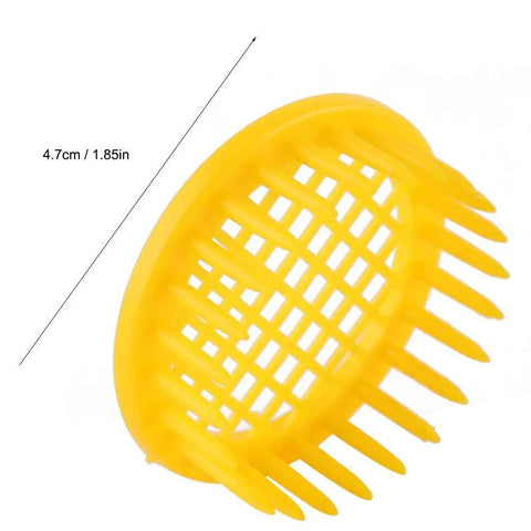 Six Piece Beekeeping Queen Rearing Box Kit With Plastic Queen Cages for isolation, close-up of yellow ABS cage, 1.85 inches long.