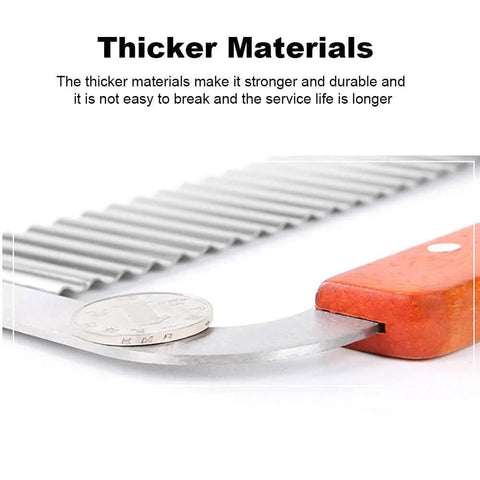 Stainless steel wavy crinkle cutter with orange handle for potatoes and vegetables.