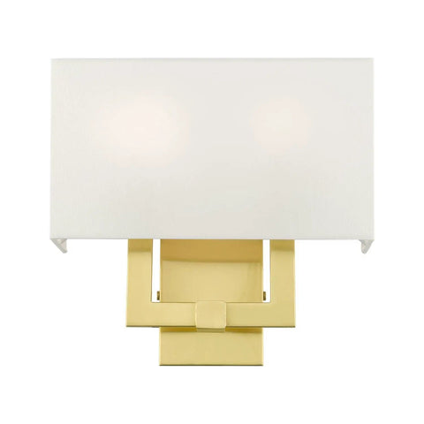Two Light Wall Sconce In Satin Brass With Dope Off White Hardback Fabric Shade For A Clean Modern Vibe ADA Compliant Meridian Collection Contemporary Home Lighting 13 By 12.5 Inches