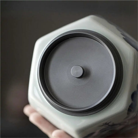 Top view of Classic Blue And White Ceramic Tea Jar Big Boy Airtight Loose Tea Storage Caddy For Kitchen Pantry Organization.