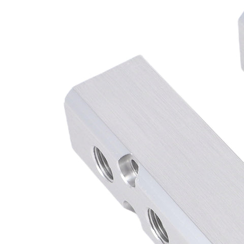 Close-up of 2 Pack Pneumatic Air Manifold Kit, 5 Way 7 Port Aluminum Alloy Block corner showing NPT output ports.