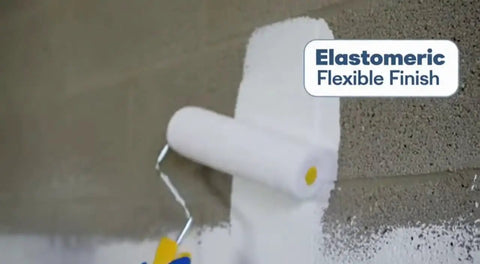 A paint roller applying Super Slick Basement Sealer White 5 Gallon on a concrete wall for waterproofing.