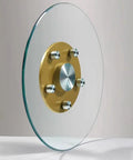 Flawless Finish Tempered Glass Lazy Susan And Smooth Gliding Rotating Serving Tray For Dining Tables with golden base.