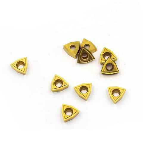 Pack of 10 WCMT2.52 55 Degree Diamond Carbide Turning Inserts For CNC Lathe And Indexable Tool Holders, shown in disarray