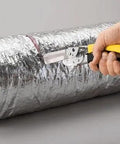 FDC3 Flex Duct Tool cutting flex duct with built-in wire cutter and double-edged knife blade, for fast pro-level installations.