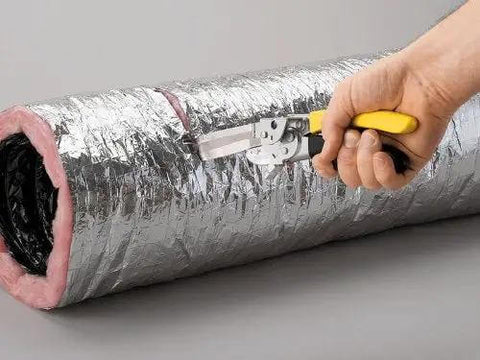 FDC3 Flex Duct Tool cutting flex duct with built-in wire cutter and double-edged knife blade, for fast pro-level installations.