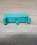 Heavy Duty Green Normally Open Contact Block Wno For 22Mm Pilot Devices With 10 Amp And 600 Vac Rating side view on a wooden surface.