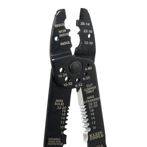 Close-up of American Made Multi Tool Wire Stripper Cutter And Crimper For 8-22 AWG with measurement markings and bolt holes.