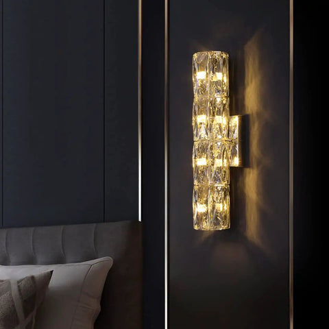 Gold Crystal LED Wall Light Sconce Dope Modern Elegant Wall Mount Lamp illuminating dark wall in bedroom
