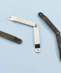 Two Pack Wooden Box Hinges For Lid Folding Positioning And Tripod Support in metal finish on light background