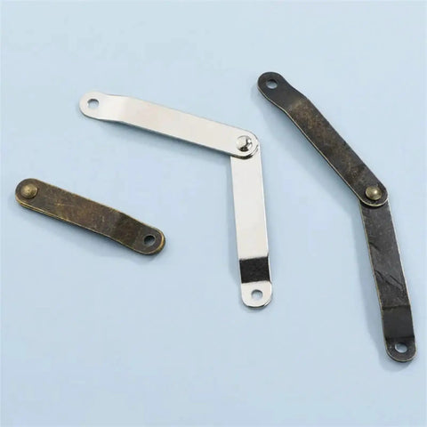 Two Pack Wooden Box Hinges For Lid Folding Positioning And Tripod Support in metal finish on light background