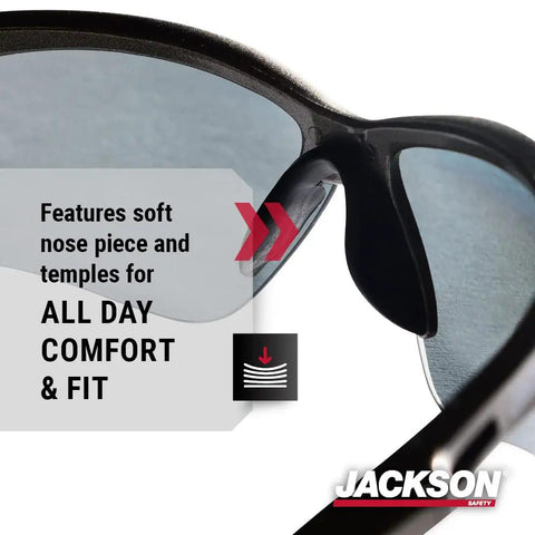 Close-up of Heavy Duty Safety Glasses With Hard Coated Anti Scratch Polarized Lenses For Crisp Vision And Slip On Fit Ansi Z87 Certified Eye Protection That Handles The Daily Grind Pack Of 12 For Work Sites showing soft nose piece and temples.