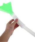 Person holding Adjustable Seeder Replacement Tube for Farm Seeders, plastic body, green and white, for wheat and corn seed flow.