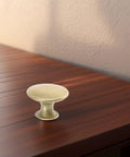 Vintage Round Cabinet Knobs Gold Finish Hardware Set Of 6 For Kitchen And Furniture Antique Dresser Pulls on wooden surface