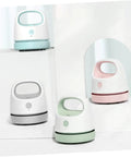 Fuss Free Rechargeable Desktop Vacuum Cleaner That Knocks Dust And Pet Hair To The Curb In Seconds in four color variations on display.