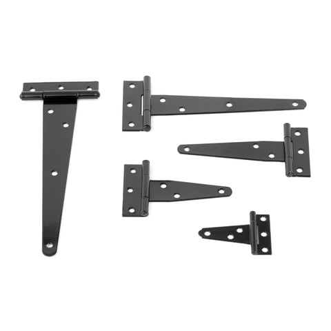 Hella Sturdy Heavy Duty T Shaped Black Iron Barn Door Hardware Kits Built Tight For Rustic Kitchen Cabinets Secure Wardrobes And Patio Gate Brackets Pair including multiple black iron T-hinges.