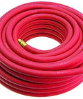 Badass Heavy Duty 1 Inch Red Field Hose Crafted From Abrasion Proof Synthetic Rubber With Reinforced Spiral Yarn coiled for high pressure use.