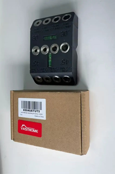 Multi Angle Cable Railing Drill Guide Jig With Built In Bubble Level For Deck Posts And Stair Railings on a cardboard box.