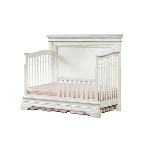 Solid Wood Toddler Guard Rail for Convertible Crib to Toddler Bed, 54.81 Inch Wide, Brushed White Finish, Sturdy Safety Rail for Nursery and Youth Bedroom Furniture shown as a solid hardwood rail transforming crib to toddler bed