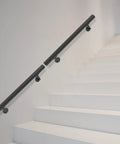 Heavy Duty Wall Mount Stair Handrail In Sleek Black Stainless Steel delivers solid grip and dependable support for indoor steps.