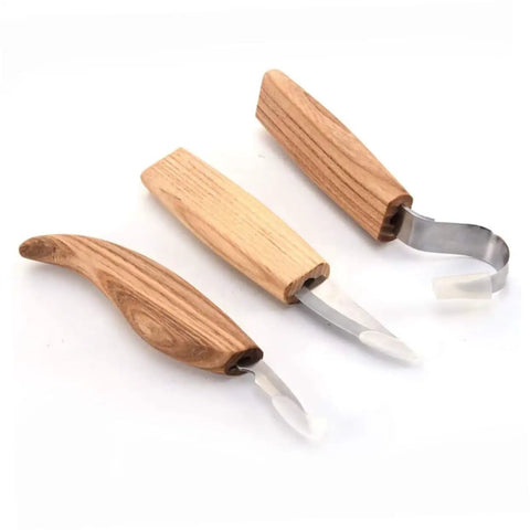 Top Shelf Steel Carving Knife Set Featuring Three Razor Drawknives And Heavy Duty Chisels Built To Slice Through Solid Timber Like Butter Ideal For Handy Folks Crushing Custom Woodwork Projects - three steel knives with wooden handles.