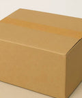 Eco Friendly Brown Kraft Paper Packaging Tape sealing a cardboard box, Tough As Nails Heavy Duty Biodegradable Sealing Tape, Writable