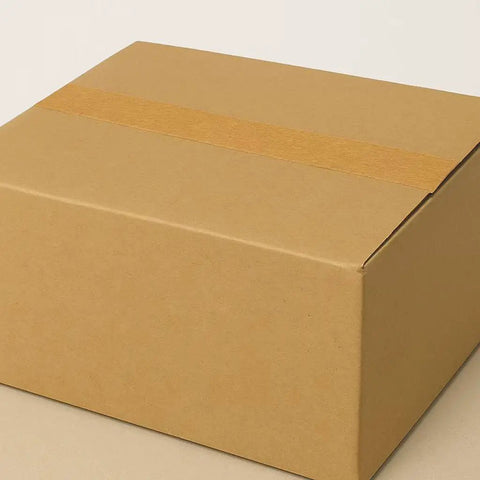Eco Friendly Brown Kraft Paper Packaging Tape sealing a cardboard box, Tough As Nails Heavy Duty Biodegradable Sealing Tape, Writable
