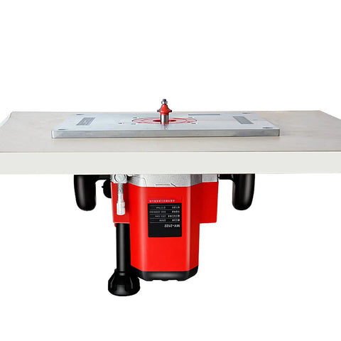 Heavy Duty Aluminum Router Table Insert Plate For Woodworking Benches With Slick Router Insert Rings And Hardware No Sweat Setup Hella Durable 12 Inch Router Base Replacement mounted on a workbench with router attached.