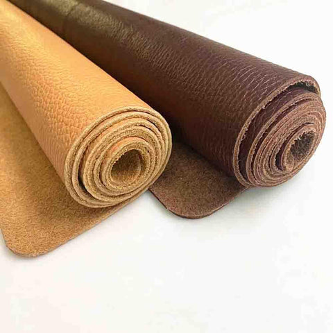 Rock Solid Wide Flat Leather Straps, Knockout Full Grain Cowhide Hide Sheet In Warm Brown Red, 39 By 39 Inches Featuring Natural Litchi Grain Matte Finish For Crafting, rolled leather sheets in warm tones.