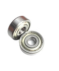 Check Out These Awesome 2 Pack Of 6205ZZ Deep Groove Ball Bearings Measuring 25 By 52 By 15 Millimeters With Abec Three Precision Rating Designed For Heavy Duty Industrial Drilling Applications That Need To Get It Done Without Any Wobbling Or Friction: close-up view of two precision ball bearings.