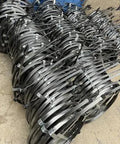 Heavy Duty Manganese Steel Sewer Snake Drain Rooter With Comfort Grip Handle clears stubborn clogs, displayed in neat stacks.
